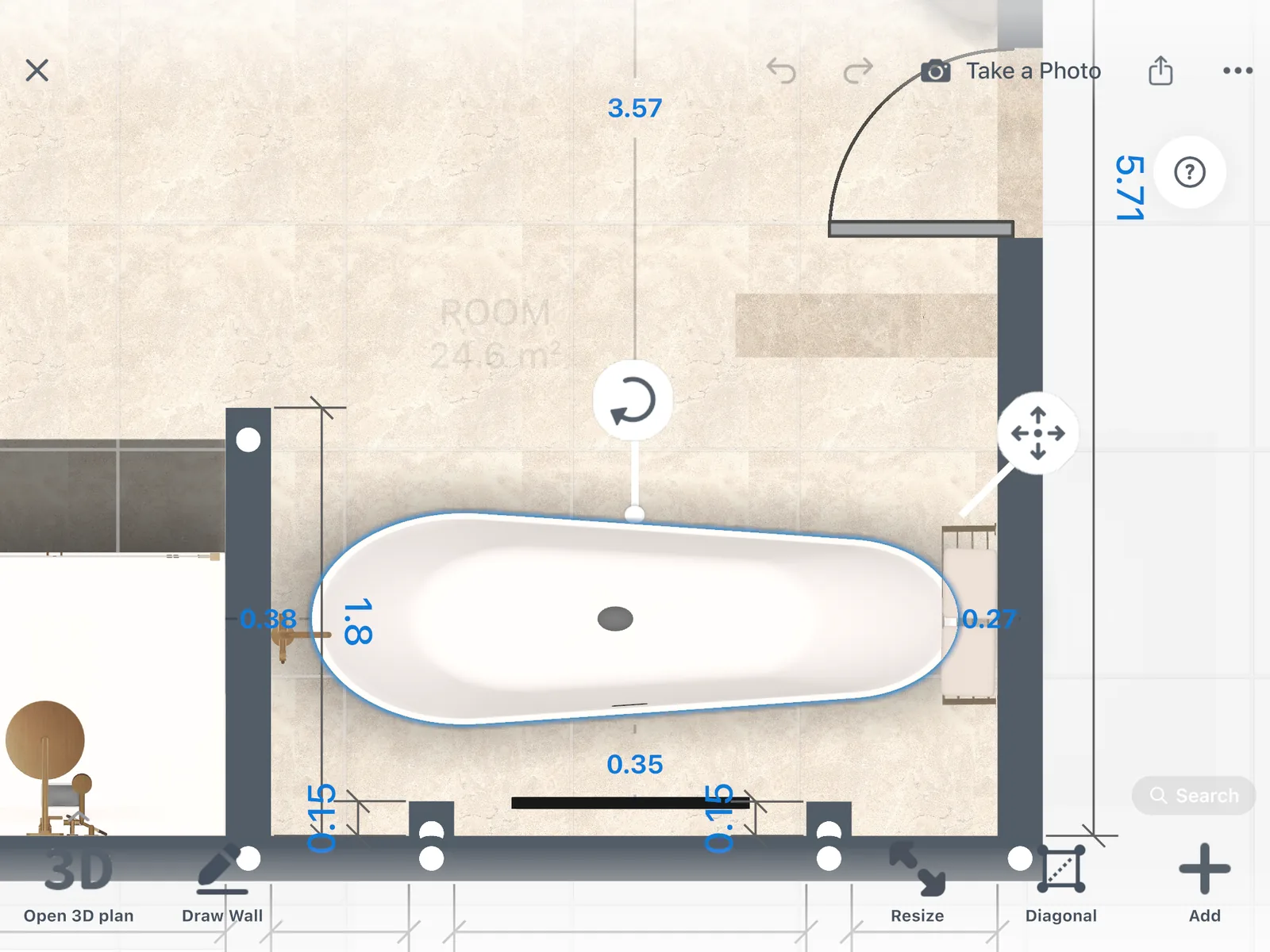 The bath selected on the 2D plan of a bathroom, with its distance markers to the walls and the objects around it