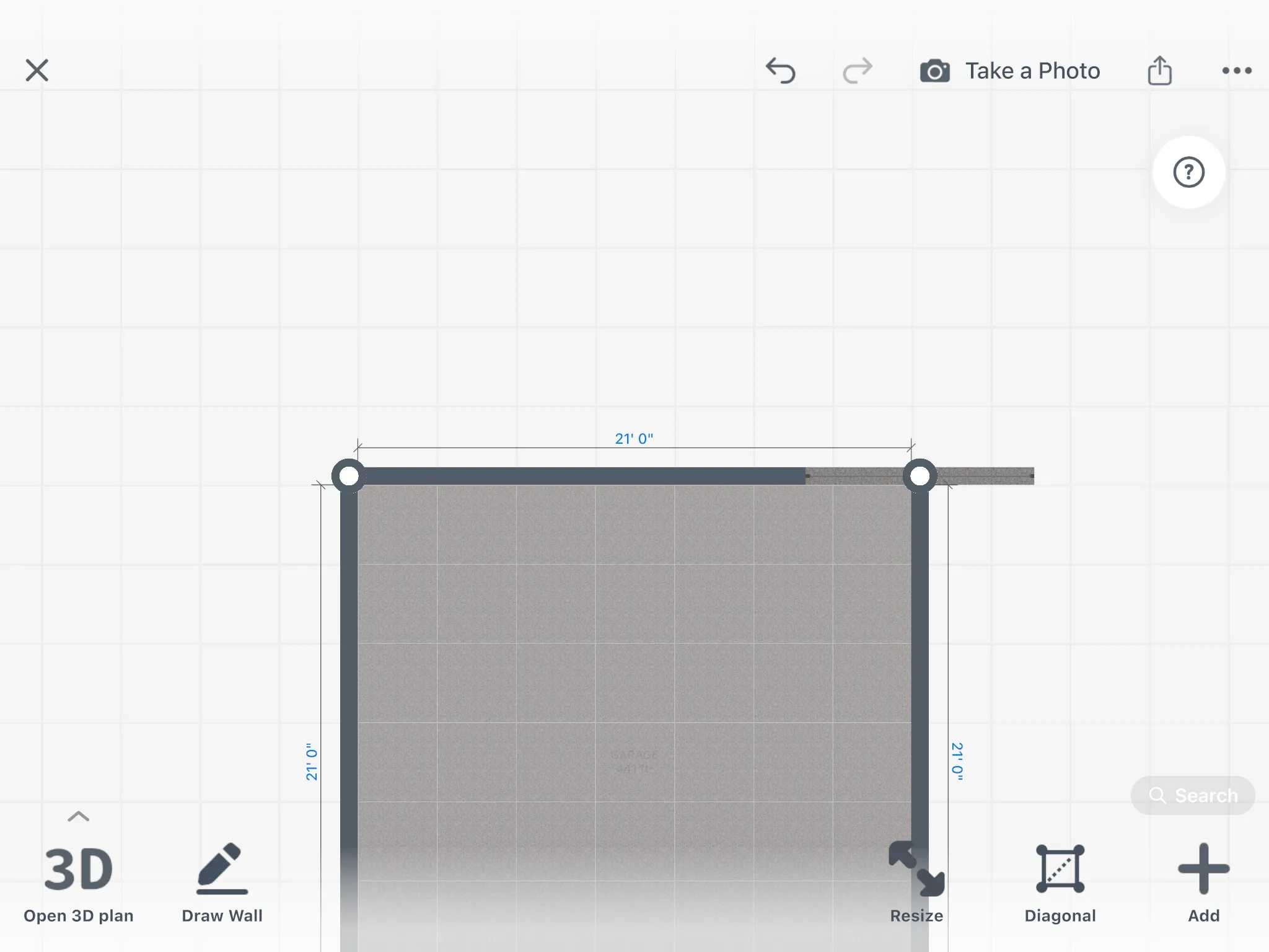 The 2D plan of a two-car garage with the length of each wall and the garage door