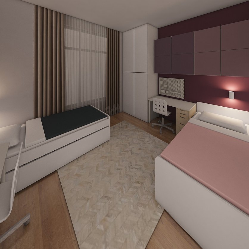 A shared kids' room with two beds and a desk