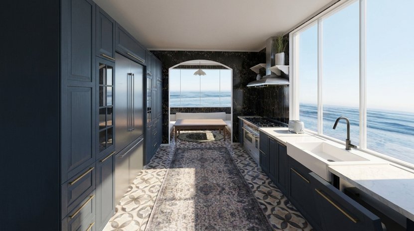 A galley kitchen: tall dark blue cabinets on one side, the sink and the cooktop under the window on the other, a patterned floor between
