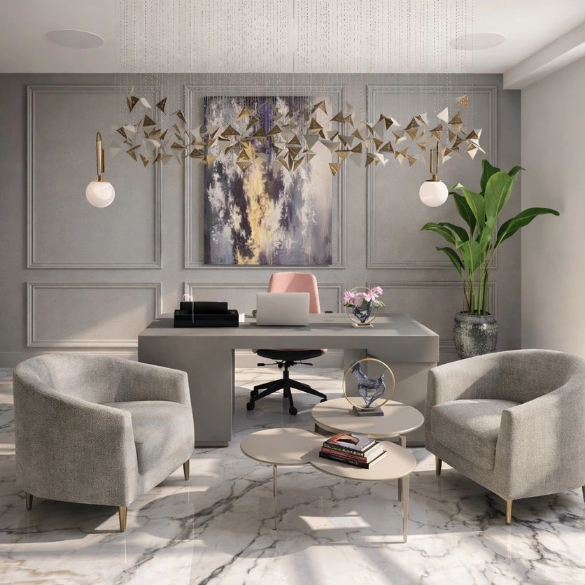 A private office: a desk with a laptop and a desk chair in a closed panelled room, two armchairs and round coffee tables in front